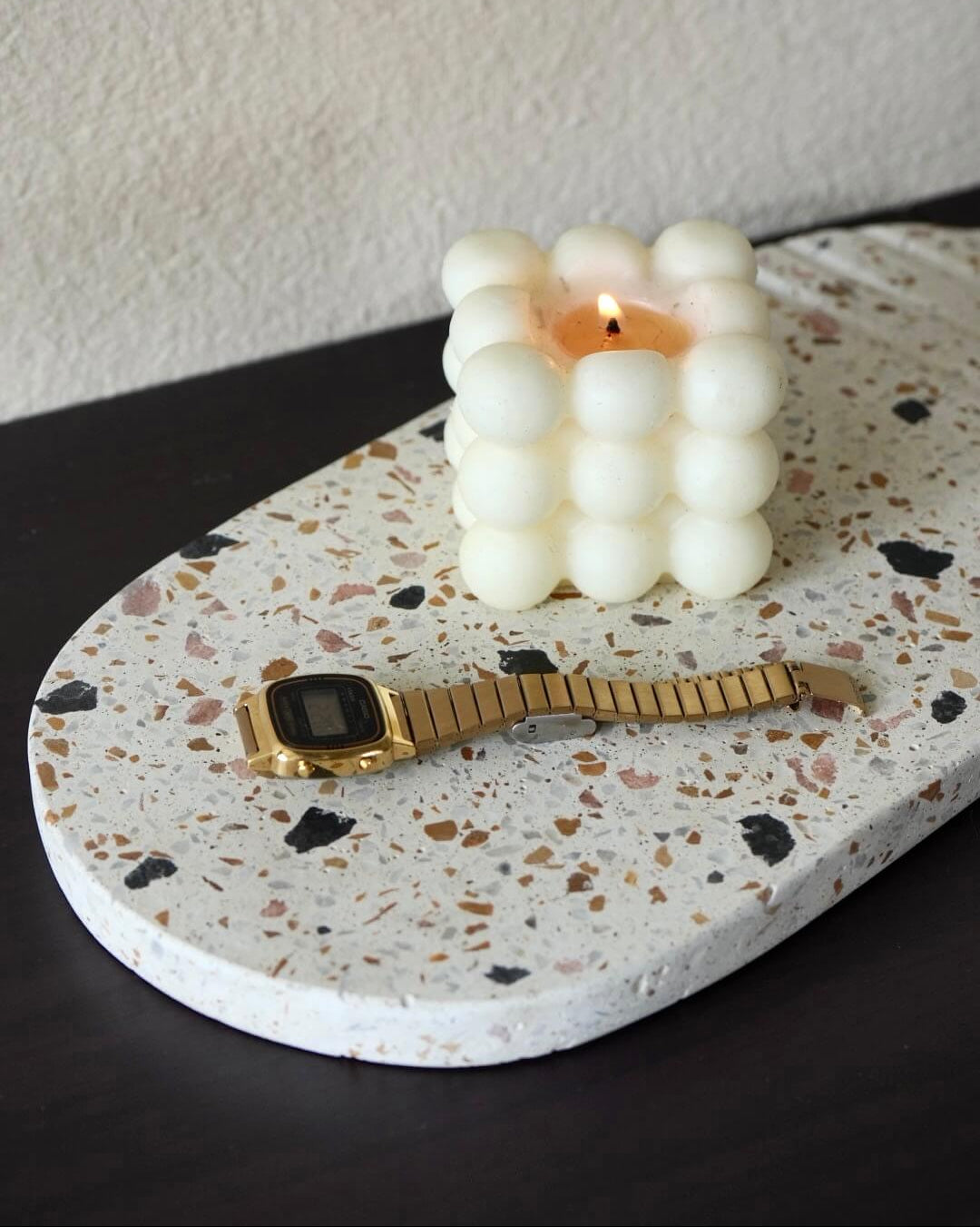 Oval White Terrazzo Trivet with bubble candle